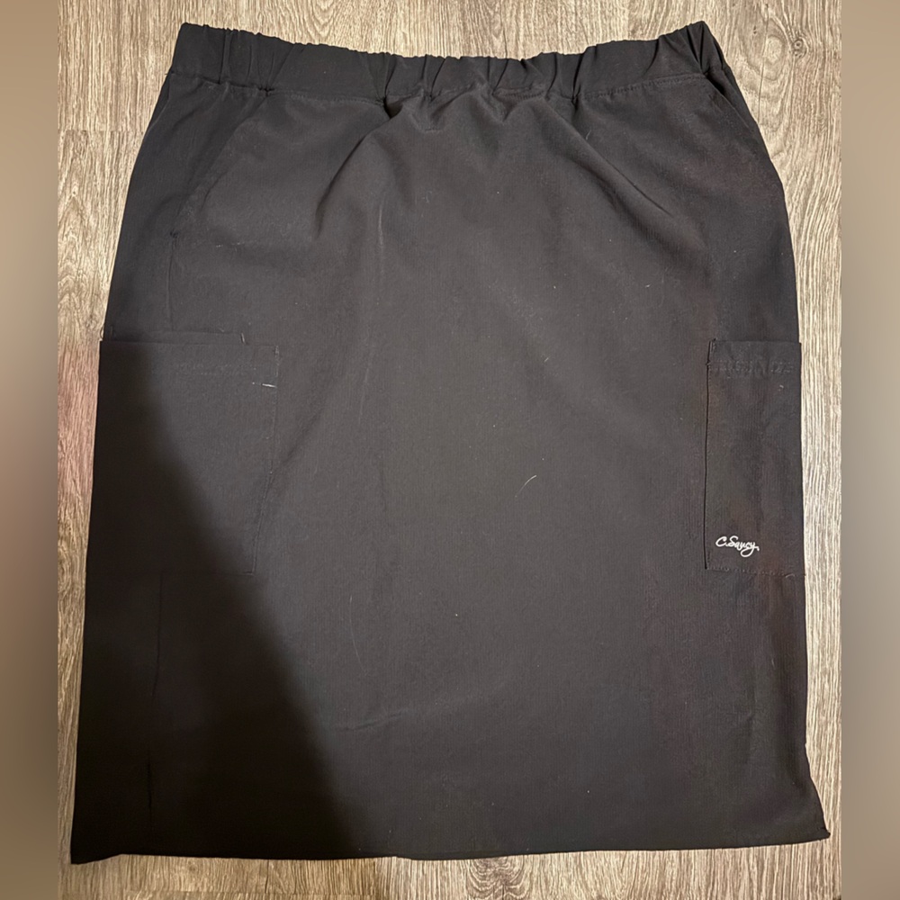 C. Saucy Black Scrub Skirt